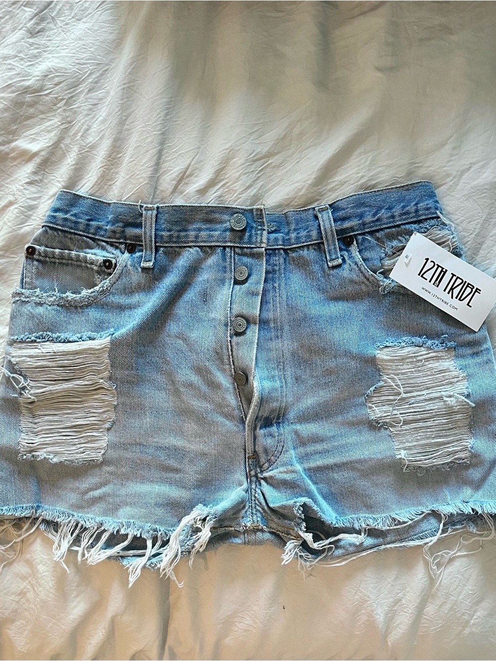 Levi's Light Blue Distressed Denim Shorts
